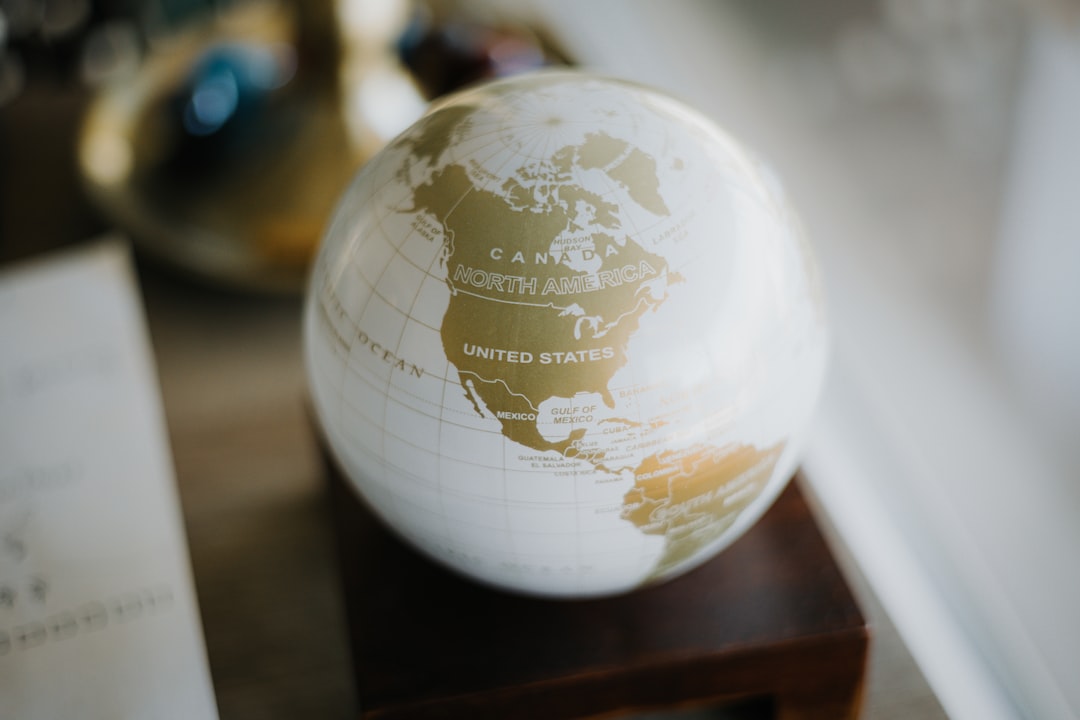 Photo Alabaster Globe Linear Pendant